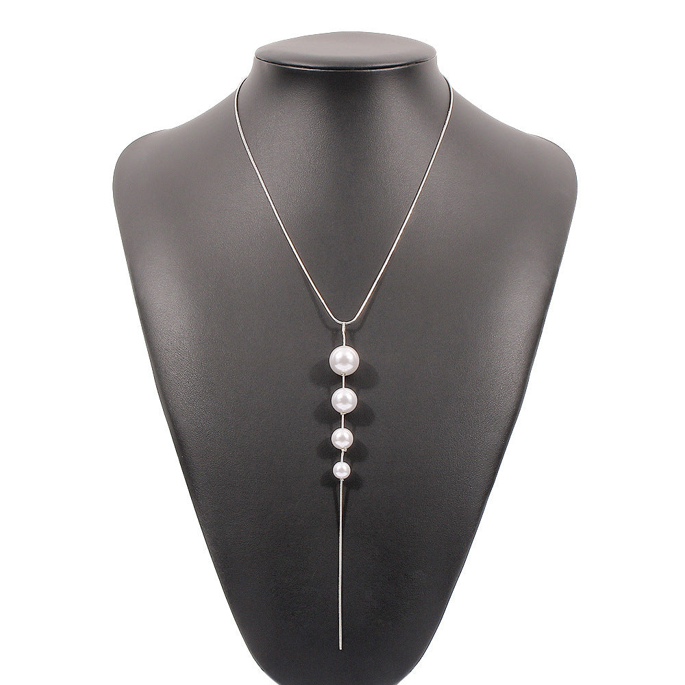 Elysian Tassel Pearl Drop